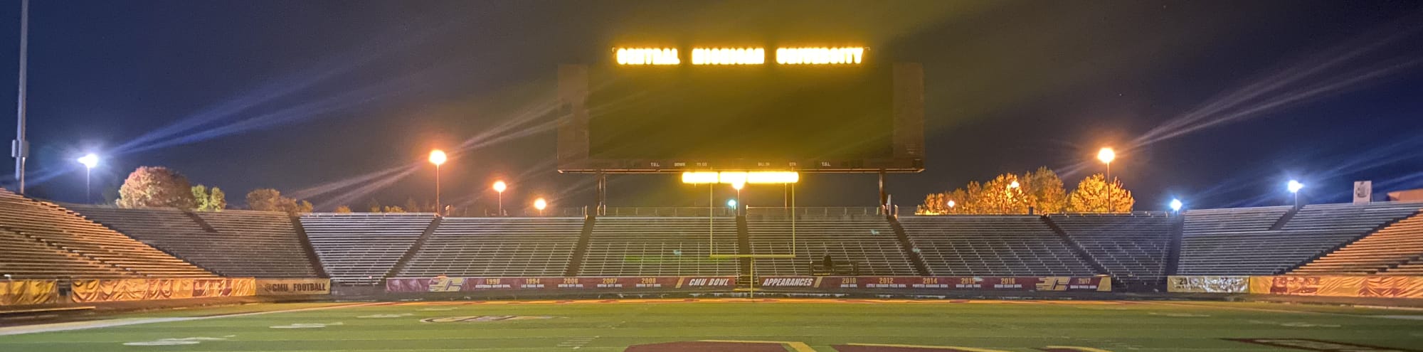 empty football stadium at night under the lights Orlando